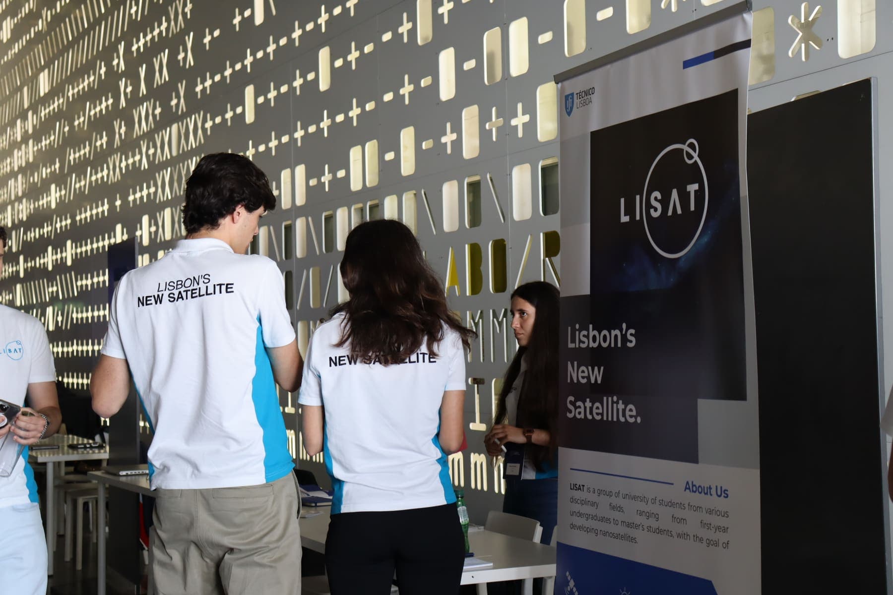 LISAT booth and roll-up