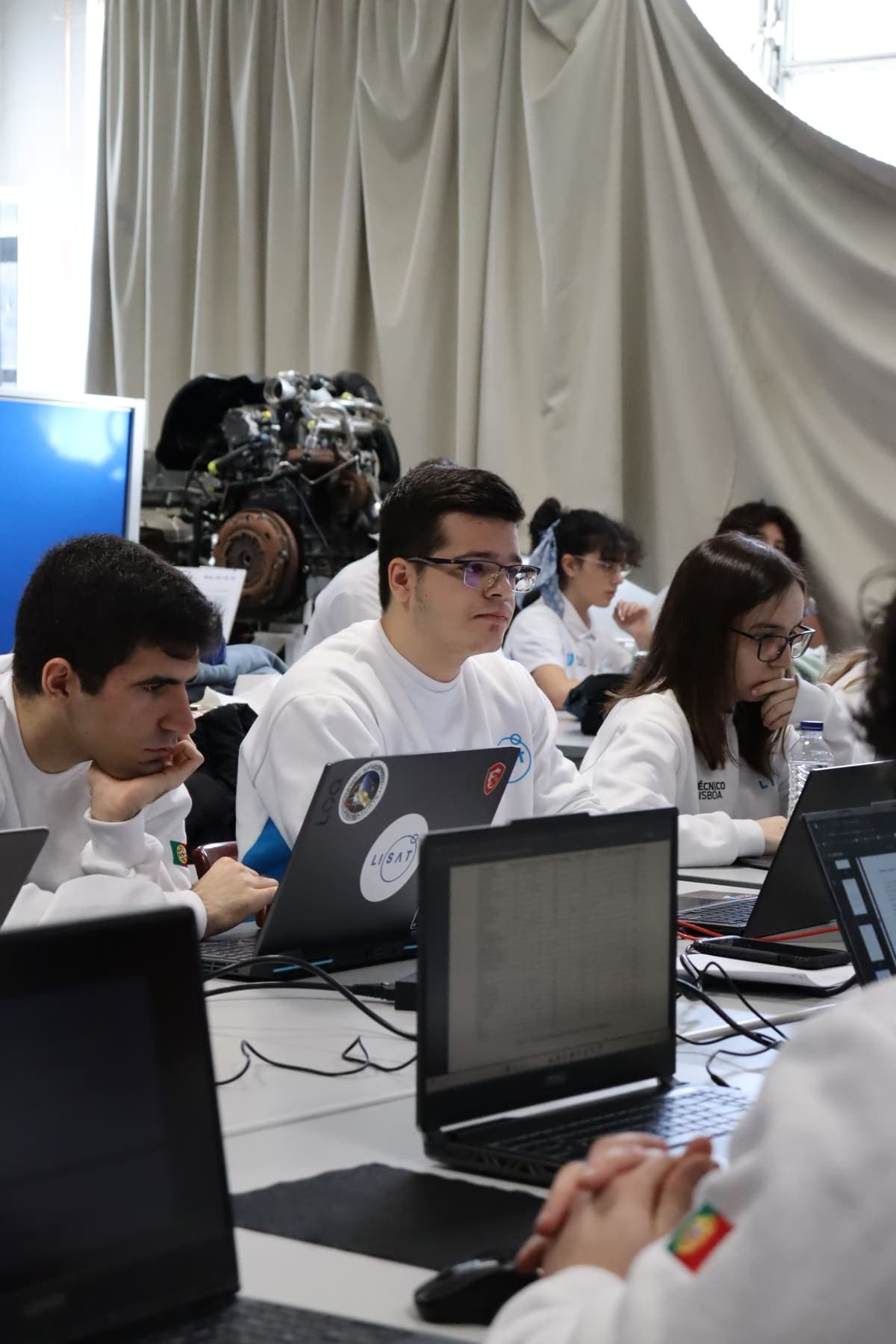 A LISAT member taking notes during the review